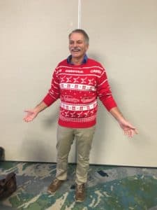 carstar employee wearing christmas sweater