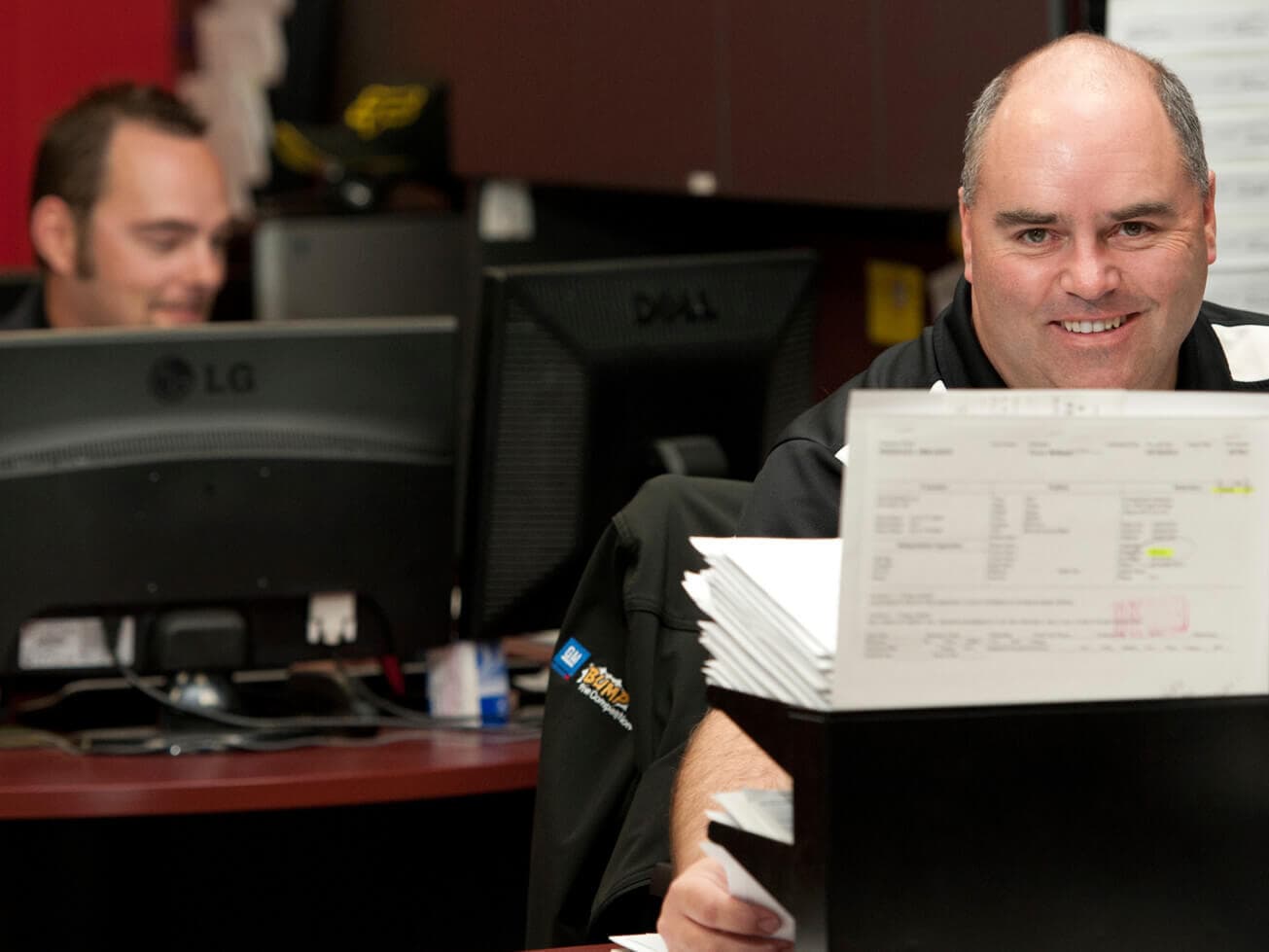 Men working at desks